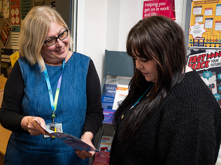 A student receiving advice from our student services department