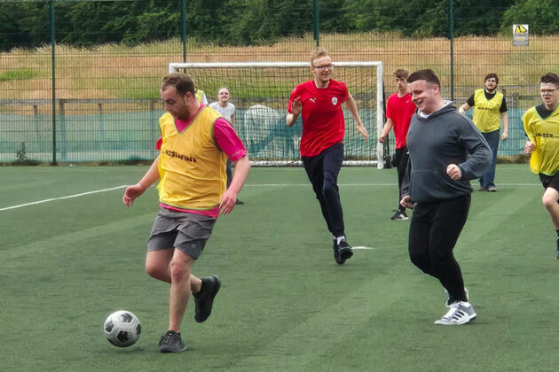 Flex students playing football at their sports day